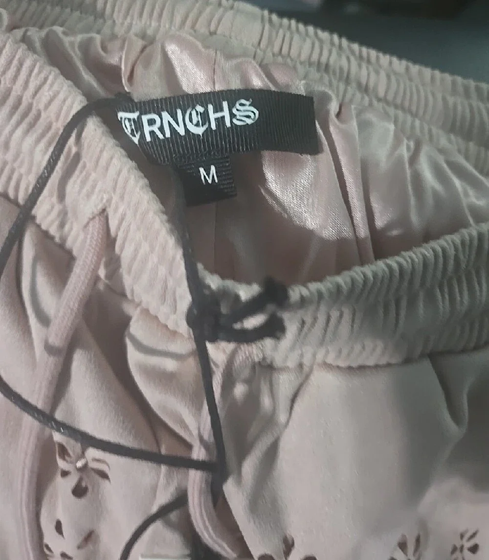 men’s Dusty Pink Laser-Cut Drawstring Shorts